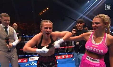 boxing girl flashes crowd after win|Boxer Daniella Hemsley celebrates win by flashing crowd